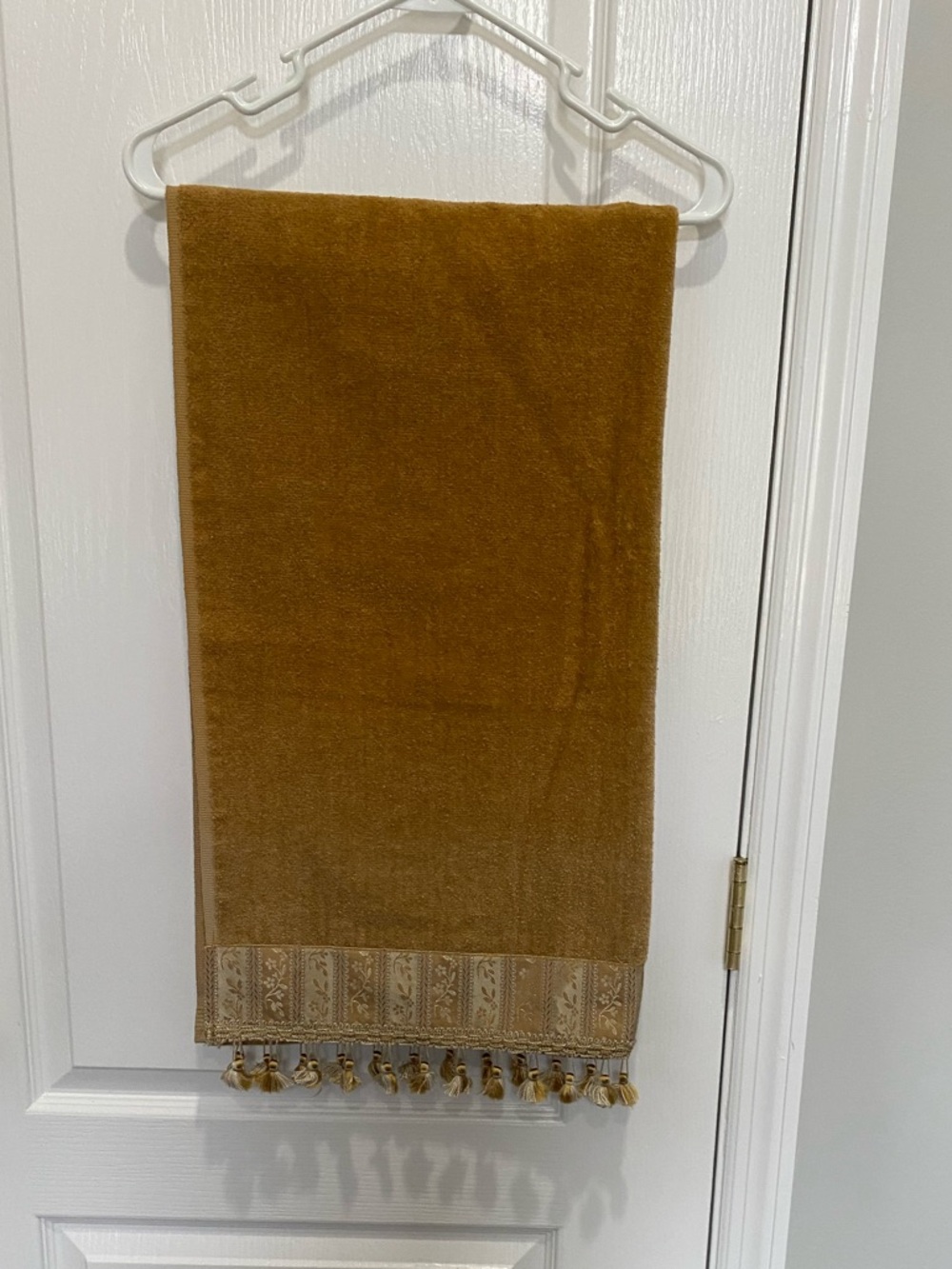 Avanti Mustard Decorative Hand Towel with Tassel Border